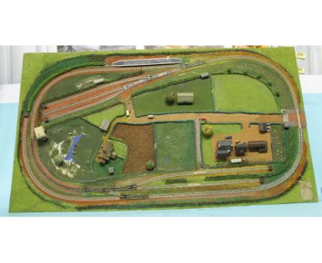 N gauge model train layout set features track building scenery etc on board 76 x 137 cm