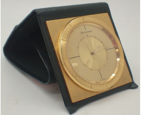 Jaeger Le Coultre square folding gold travel clock in leather case  CONDITION REPORT: This item is working at lotting but we 