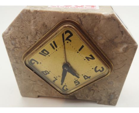 Art Deco alarm clock in marble case CONDITION REPORT: This item appears to be working at lotting. We do not comment on time k