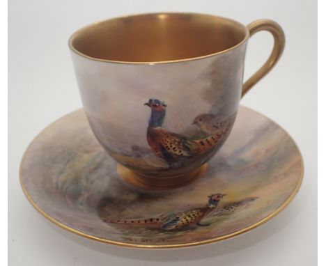 Royal Worcester gilded demi-tasse cup and saucer decorated with pheasants signed Jas Stinton c1922 CONDITION REPORT: This pie