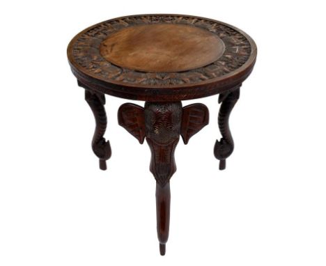 A CARVED INDIAN TRIPOD TABLE WITH ELEPHANT'S HEADS CARVED LEGS, 62CM H