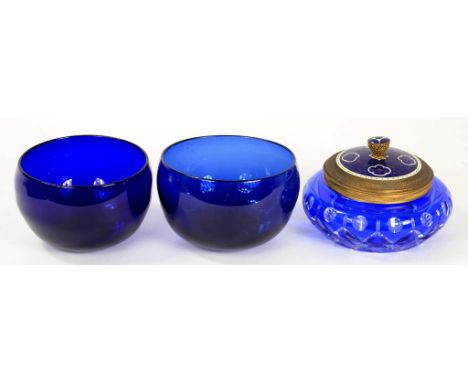 A BLUE FLASHED AND CUT GLASS POWDER BOWL WITH GILT BRASS AND ENAMEL COVER, 14CM DIAM AND TWO VICTORIAN BLUE GLASS FINGER BOWL