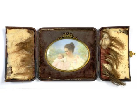 AN EARLY 20TH CENTURY PORTRAIT MINIATURE OF A YOUNG WOMAN WITH HER BABY BEFORE BLOSSOM, IVORY, OVAL, 8CM X 10.5CM, GILTMETAL 