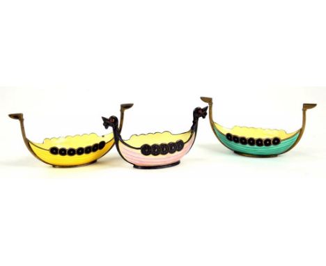 A SET OF THREE NORWEGIAN SILVER AND HARLEQUIN GUILLOCHE ENAMEL LONGBOAT SALT CELLARS, 2OZS