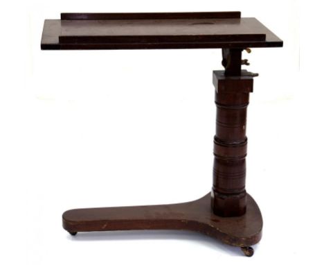 AN EDWARDIAN MAHOGANY TELESCOPIC BED TABLE