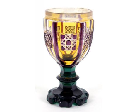 A VICTORIAN AMETHYST AND AMBER FLASHED AND CUT GLASS GOBLET ON GREEN GLASS FOOT, ENGLISH OR CONTINENTAL, 16CM H, CIRCA 1860 