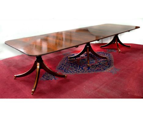 A GEORGE III STYLE TRIPLE PILLAR DINING TABLE 123 X 366CM