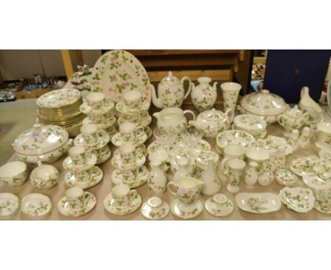 An extensive Wedgewood Wild Strawberry pattern dinner tea and table service including two tureens, dinner, side, soup plates,