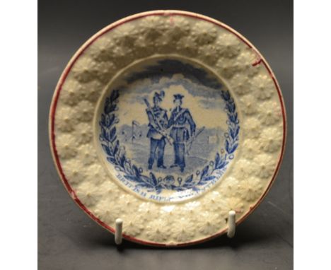 British Rifle Volunteers - a 19th century pearl ware plate, central panel printed with two soldiers, raised flower head borde