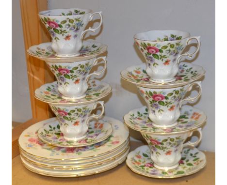 A Paragon bone china 'Garden Flowers' tea service for six, comprising teacups, saucers and plate 