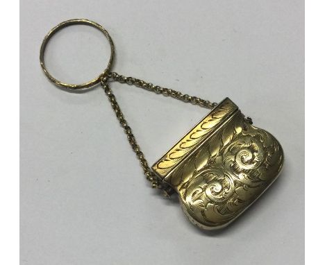 A rare silver gilt vinaigrette in the form of a handbag. Birmingham 1842. By Waddell and Kempson. Approx. 10 grams. Est. £250