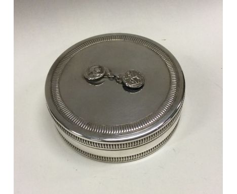 CHRISTIAN DIOR: A silver snuff box. Approx. 147 grams. Est. £100 - £120.
