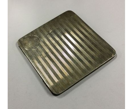 An unusual engine turned silver wallet. Birmingham. By WW. Approx. 109 grams. Est. £30 - £40.