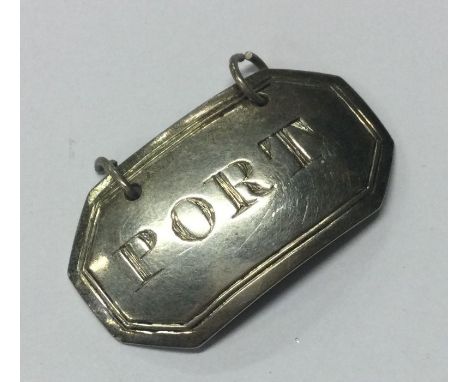 EDINBURGH: A Scottish silver wine label for ‘Port’. By AW. Approx. 6 grams. Est. £50 - £80.