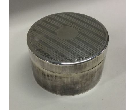 WANG HING: A heavy circular Chinese silver box. Marked to base. Circa 1890. Approx. 145 grams. Est. £300 - £400.