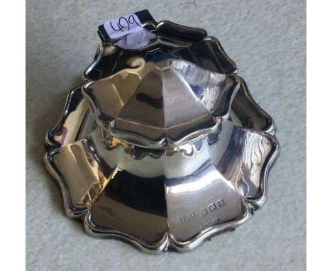 An Edwardian silver capstan inkwell. Birmingham. Approx. 209 grams. Est. £30 - £40.