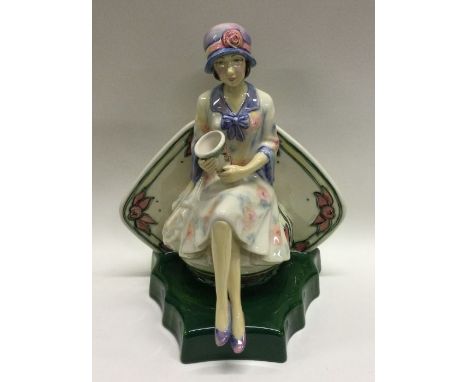 A Kevin Francis figurine, "Charlotte Rhead". Est. £60 - £80.