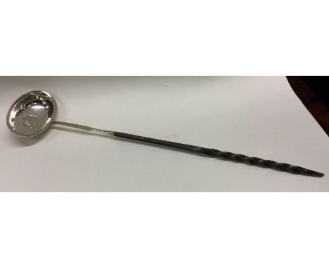 A large 18th / early 19th Century toddy ladle. Approx. 40 grams. Est. £50 - £80.