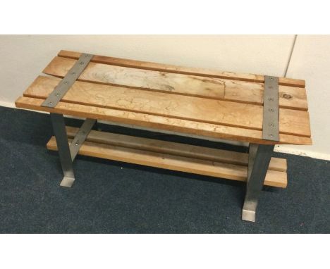 A good quality chrome bench. Est. £20 - £30.