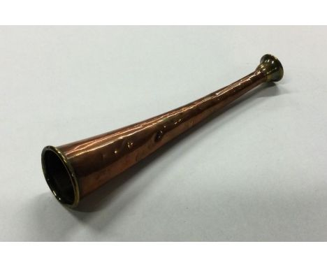 An old copper hunting horn. Est. £10 - £20.