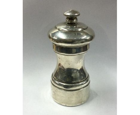 A silver pepper grinder of typical form. Approx. 158 grams. Est. £30 - 350.