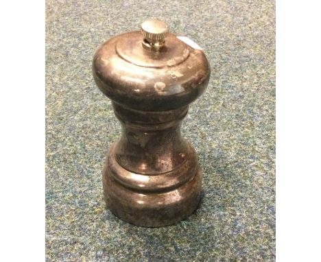 A large silver pepper grinder. London 2003. By R&amp;D. Approx. 212 grams. Est. £30 - £50.