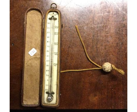 An Antique travelling thermometer in leather case. Est. £20 - £30.