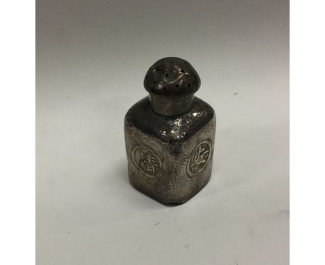 An unusual chased Chinese silver pepper. Marked to base. Approx. 29 grams. Est. £50 - £80.