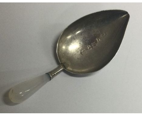 A silver caddy spoon with oval bowl. Birmingham 1806. By William Pugh. Approx. 7 grams. Est. £70 - £90.