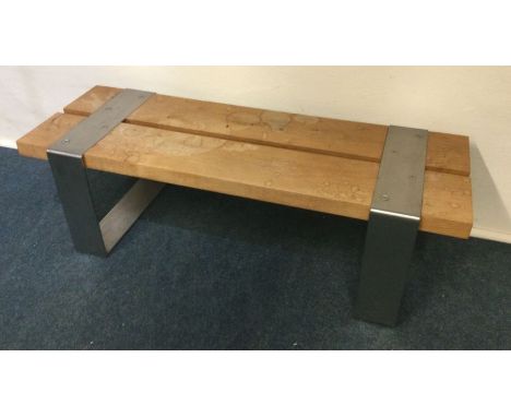 A good quality chrome bench. Est. £20 - £30.