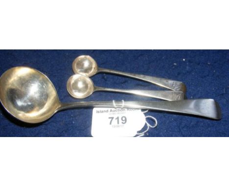 A Georgian silver sauce ladle - London 1803 and two ditto silver salt spoons