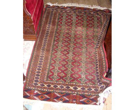 A Middle Eastern style carpet with geometric border