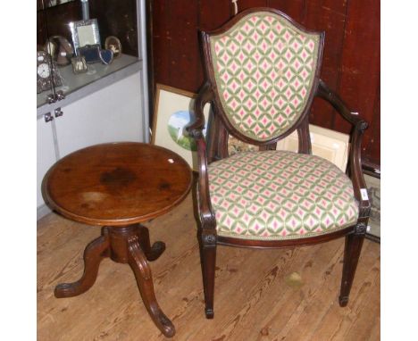 A shield back shaped armchair, together with a mahogany wine table