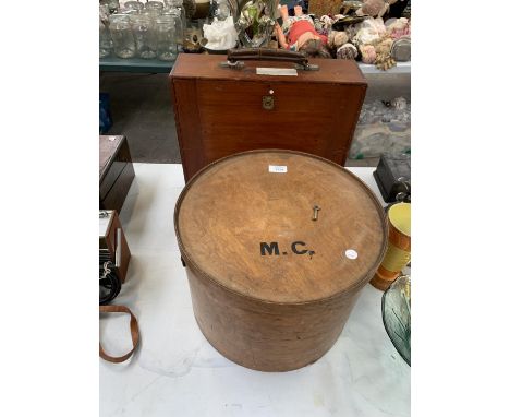 A VINTAGE WOODEN HAT BOX AND WOODEN SUITCASE 