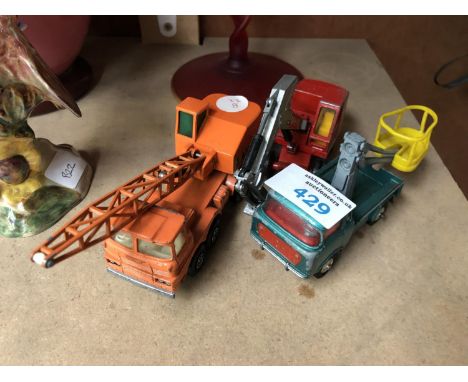 THREE VINTAGE CRANE TOYS, TO INCLUDE CORGI EXAMPLE 