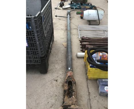 A CAST IRON VINTAGE STREET LAMP POST WITH COVERED LIGHT 