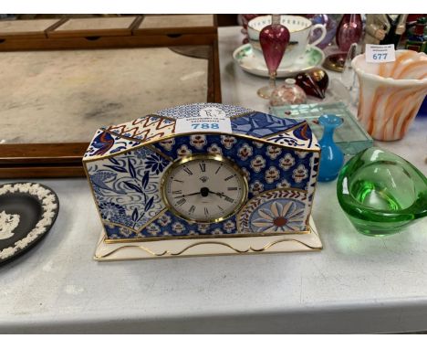 A CERAMIC MASONS IRONSTONE MANTLE CLOCK 