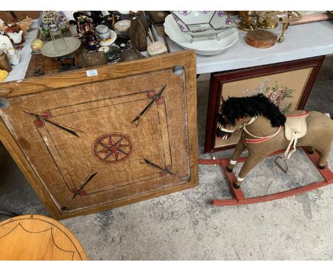 MIXED ITEMS - AN ARTS AND CRAFTS TAPESTRY WITH WOODEN FRAME, GAMES BOARD, BRASS LAMP AND SHADE AND ROCKING HORSE 