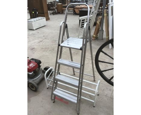 A FOUR RUNG ALUMINIUM STEP LADDER AND A SHOE RACK 