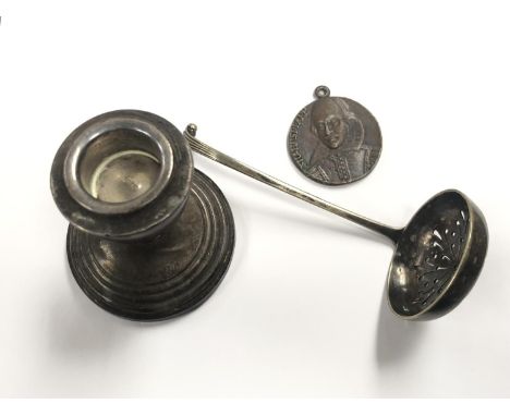 A HALLMARKED SILVER DWARF CANDLESTICK, SIFTER AND MEDAL (3) 