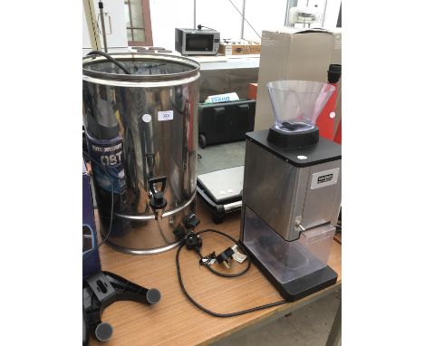 AN INDUSTRIAL COFFEE GRINDER AND TOASTIE MAKER IN WORKING ORDER AND AN URN (NO LID) 