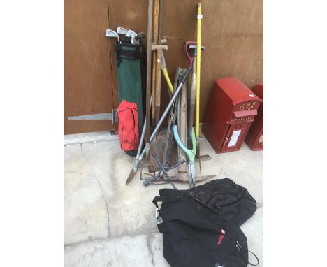 VARIOUS GARDEN TOOLS TO INCLUDE A PICK AXE, RAKE, SHOVEL, TRIMMERS ETC AND GOLF BAG/CLUBS 