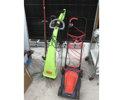 A SOVEREIGN MOWER AND VARIOUS GARDEN TOOLS 