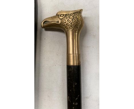 AN EAGLE HANDLED WALKING STICK 
