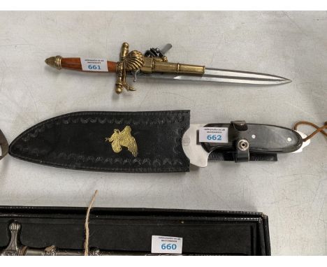 A HANDCRAFTED HUNTING STYLE KNIFE 