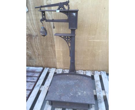 A SET OF VINTAGE INDUSTRIAL SCALES WITH WEIGHTS 