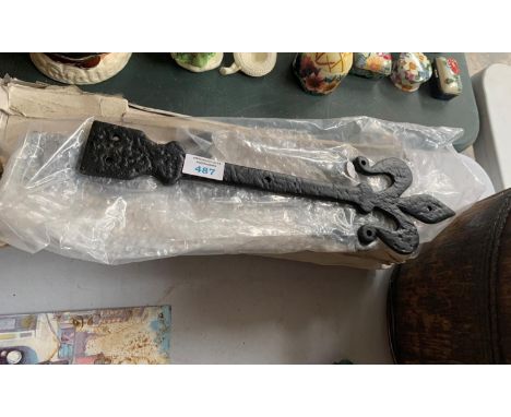 A SET OF CAST IRON GATE HINGES 