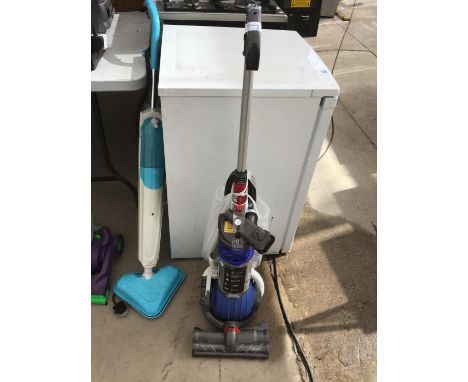 A DYSON DC 24 ROLLER BALL VACUUM CLEANER IN WORKING ORDER 