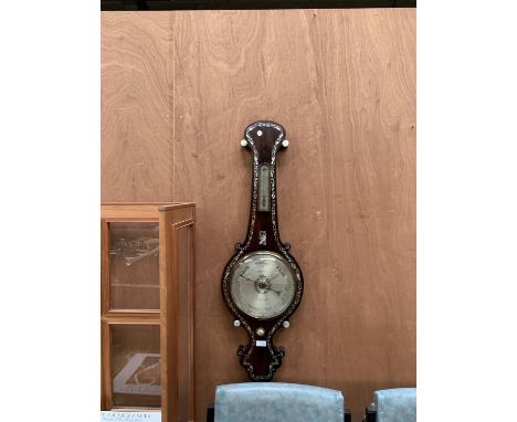 A ROSEWOOD AND MOTHER OF PEARL INLAID WOODEN BAROMETER 