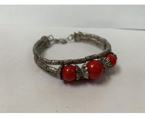 A LADIES SILVER BANGLE 